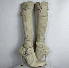 celine silver boots|Celine knee high boots.